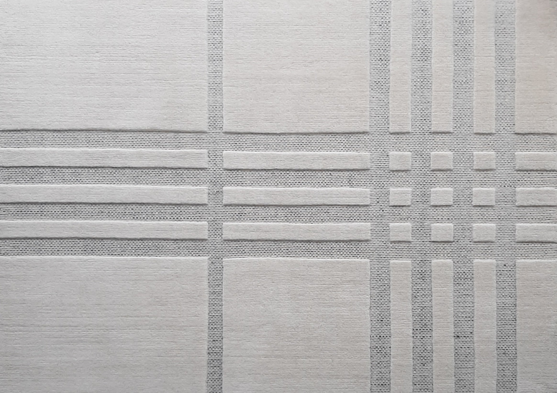 English Wool Rug with patterned tile design in an off-white color. Created by Studio 321B Toronto.