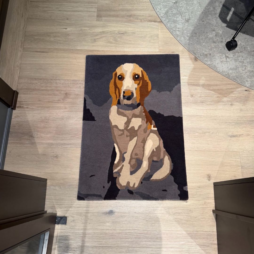 The completed custom pet rug in office.
