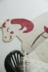 Unicorn-shaped rug by Studio 321B. 